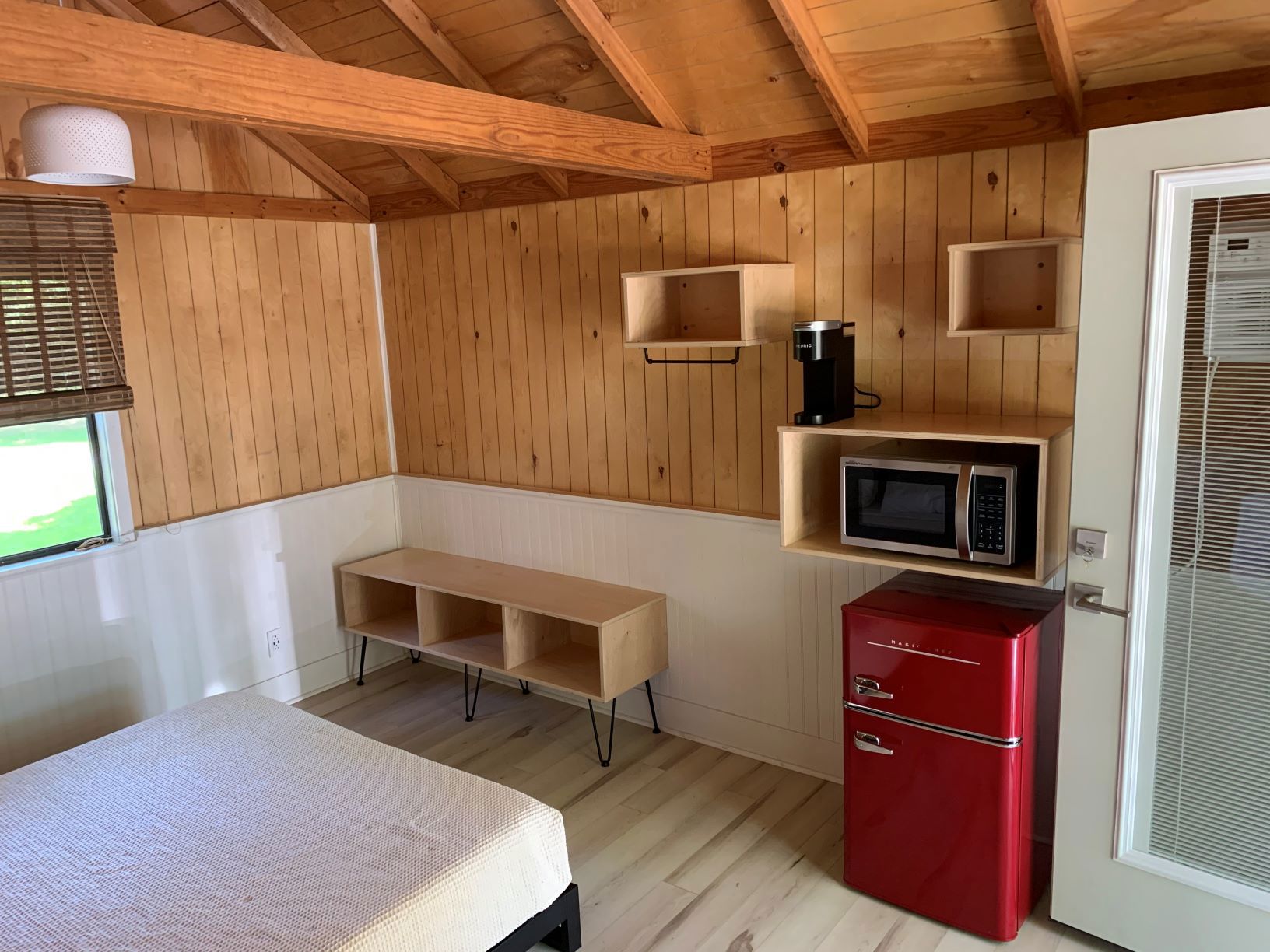 The studio cabin comes with a Keurig coffee maker, microwave, and fridge.
