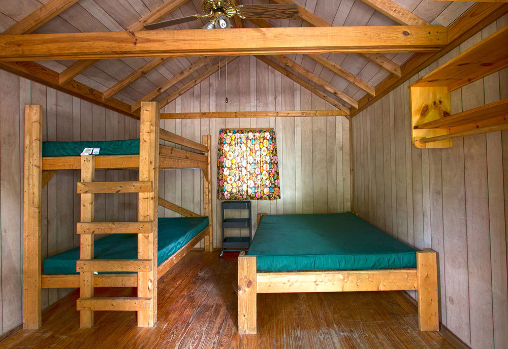 All of our cabins come with one queen size and two twin size mattresses.